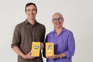 Award winning architects Archisoul Director Jo Gillies and Senior Associate Russell Rice pose with their Better Future Sydney Design Awards trophies.