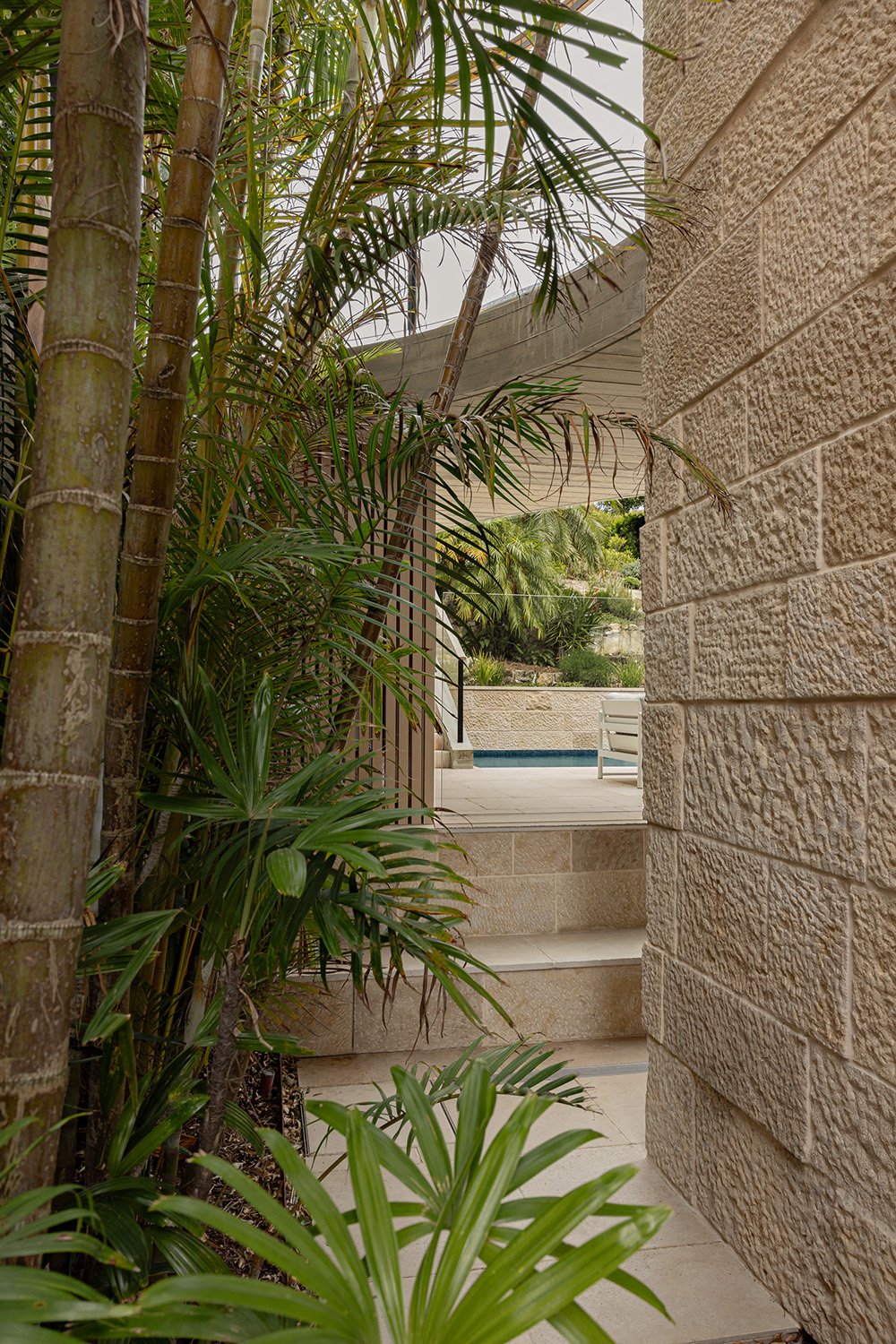 Modern coastal interior design – N&H House Bridge and Palms